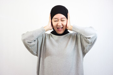 Young asian woman in hijab with angry expression. Isolated On White Background