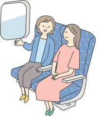 電車に乗る二人の女性