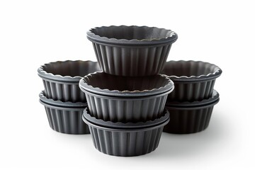 A set of mini tart pans with removable bottoms and nonstick surfaces, white background