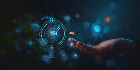 Hand holding target with text "2024" on virtual screen and arrow hitting center of the circle or bullseye for business plan, goals achievement, vision, idea concept design,