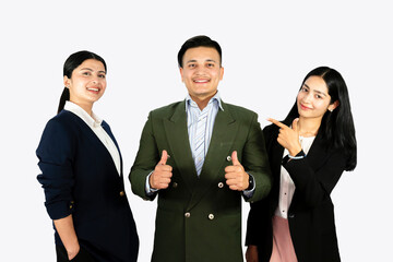 A confident and happy group of business co-workers showing teamwork in formal dress in an office