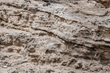 Salt weathering of beachrocks，Beachrock is a friable to well-cemented sedimentary rock. Kaena point / Yokohama bay, Leeward Coast of Oahu, Hawaii geology
