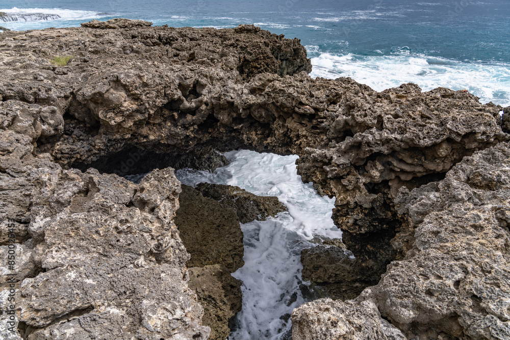 Wall mural coral reef and beachrocks，beachrock is a friable to well-cemented sedimentary rock. kaena point / yo