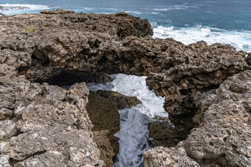 Coral reef and beachrocks，Beachrock is a friable to well-cemented sedimentary rock. Kaena point /...
