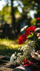 Memorial day background concept, flowers and gravestone with copy space