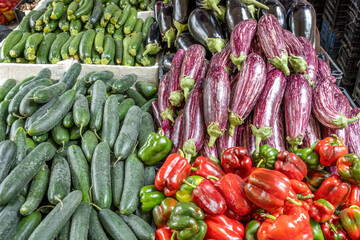 Eggplant, zucchini and pickles for sale at a market