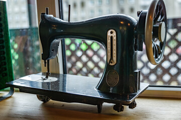 Vintage Sewing Machine on Window Sill