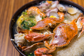 Seafood with rice noodles bowl in the restaurant