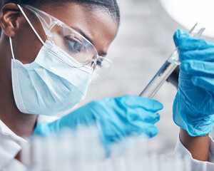 Black woman, science and research with test tube for medical innovation and ppe safety for...