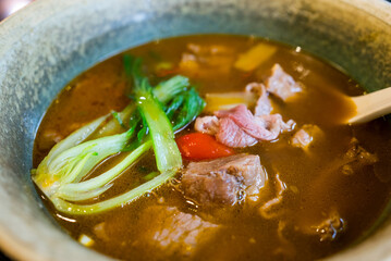 Taiwanese famous food with sliced red braised beef noodles