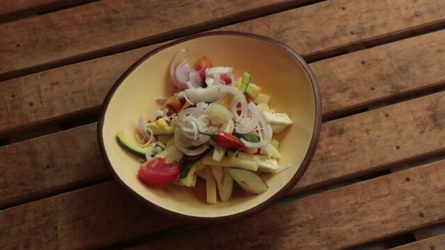 how to adding chilly and onion and adding garlic and ginger to all sliced veg like potato ,parwal, tomato, bringal together 