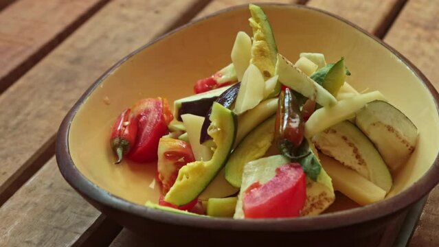 all slice veg like potato, onion, parwal, tomato, bringal mixed together