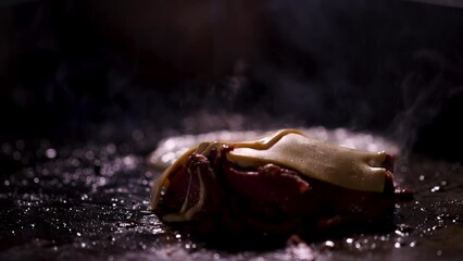 Cooking a delicious gourmet sandwich with melted cheese and egg is a delightful culinary experience