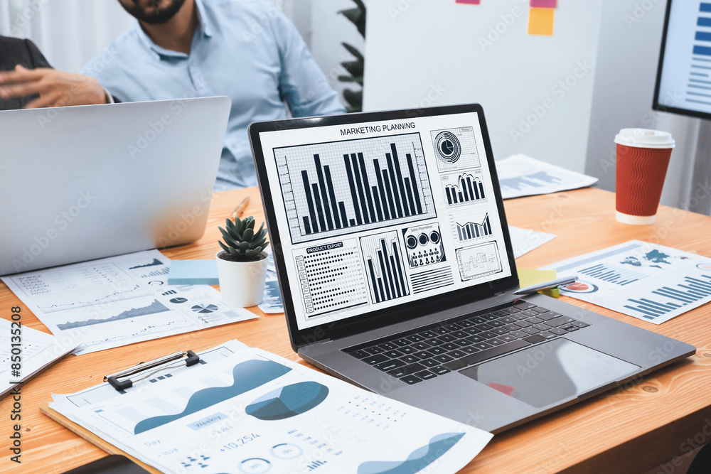 Poster multiracial analyst team use bi fintech software to analyze financial data on meeting table. financi