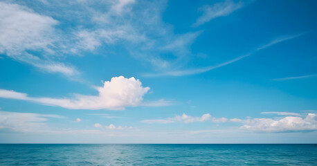 Obraz premium Idyllic View of Lush Green Hills Beneath a Vibrant Blue Sky