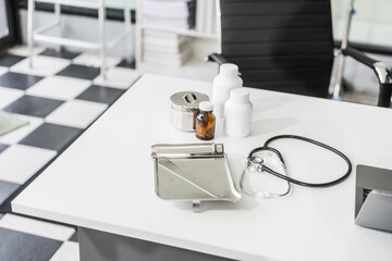 A clean desk with medical equipment, ready for professional use, sits empty, awaiting the next task or appointment.
