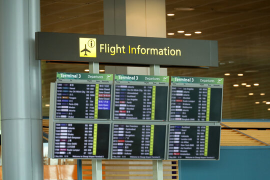 flight schedules, notice boards for flight arrival and departure schedules at the airport.