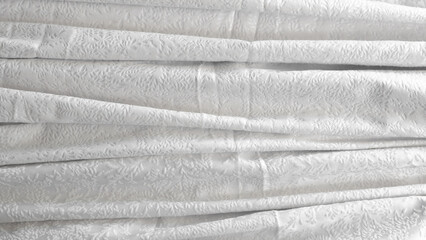minimalistic white crumpled fabric with pattern