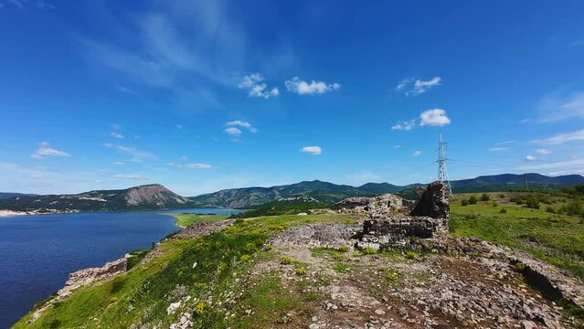 Aerial view of Ruins of ancient Vishegrad Fortress on the southern coast of Studen Kladenets reservoir near town of Kardzhali, Bulgaria
