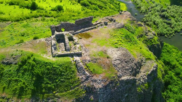 Aerial view of Ruins of ancient Vishegrad Fortress on the southern coast of Studen Kladenets reservoir near town of Kardzhali, Bulgaria

