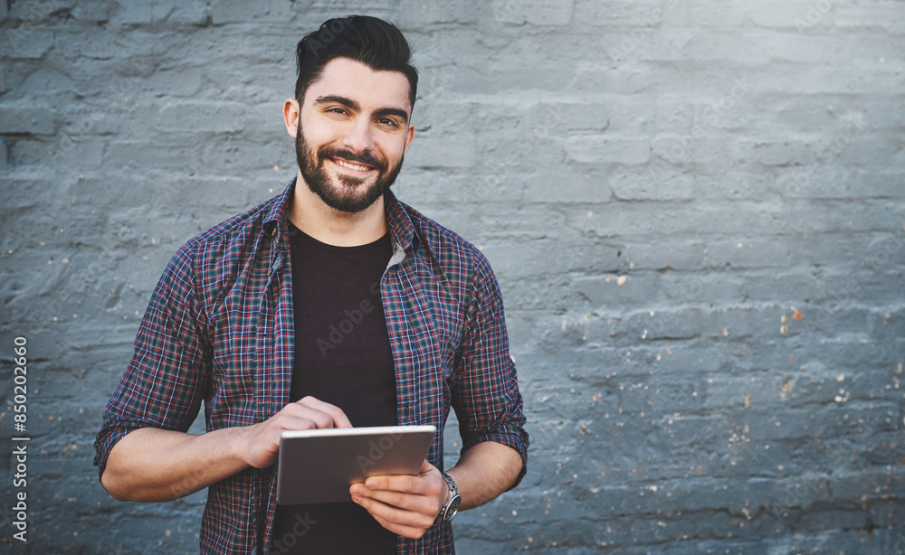 Poster Portrait, smile and tablet with web developer man on brick wall background for creative research. Administration, internet and technology with happy employee on space for professional design