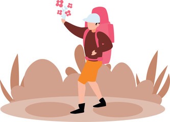 The boy is walking holding flowers.