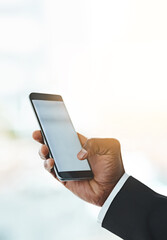 Business person, hands and browsing with phone screen for communication, online trading or news at office. Closeup of employee scrolling on mobile smartphone display for app, texting or mockup space