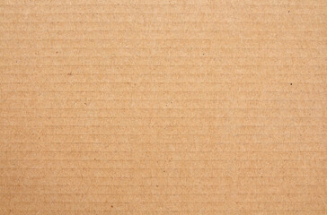 Cardboard sheet texture background, detail of recycle brown paper box pattern.
