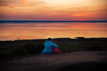 ordering on the mountain overlooking Lake Pleshcheyevo mom and daughter