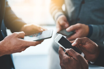 Business people, hands or communication with phone for social media, data sync or sharing at...