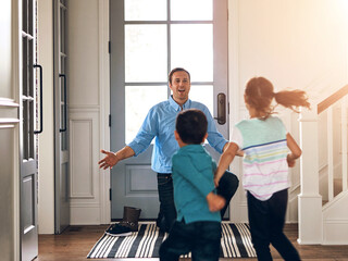 Hello, front door and dad with children hug in home for greeting, welcome and bonding. Family,...