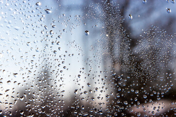 Dripping Condensation, Water Drops Background Rain drop Condensation Texture. Close up for misted glass with droplets of water draining down