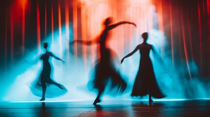 Blurry silhouettes of elegant dancers gracefully moving across the stage.