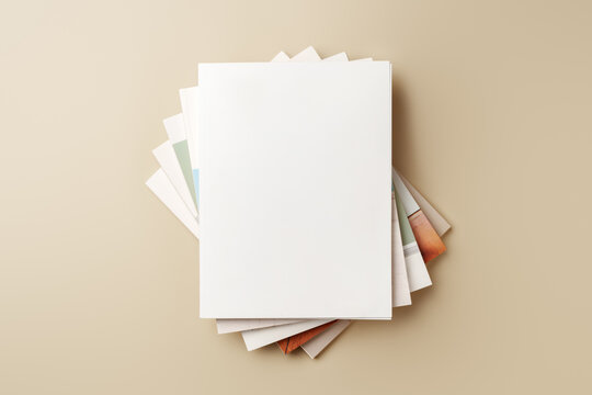 Stack of blank paper on beige background
