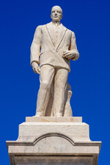 Obraz premium Statue in memory of Joao Inacio de Sousa in front of the main church of Velas. São Jorge Island-Azores-Portugal.