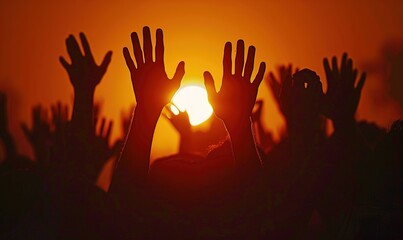Collection of silhouettes of hands pointing upwards in a photo in the afternoon