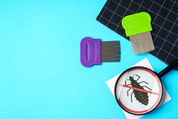 Anti lice equipment on blue background top view