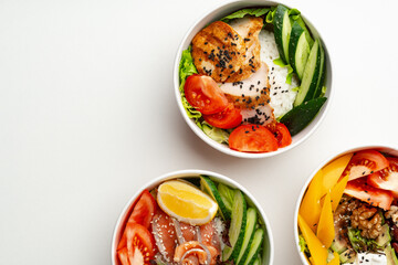 Tasty take out poke bowls isolated on white background