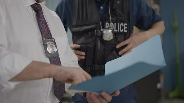 Cops police detective reading documents