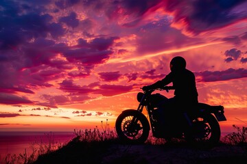 A silhouette of a man sitting on a motorcycle parked on a hilltop, overlooking a vibrant sunset with the ocean in the distance. Generative AI