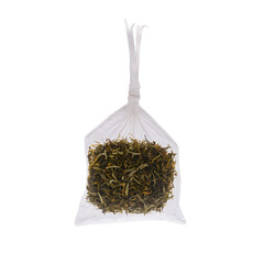 Transparent plastic bag full of loose tea leaves isolated on a white background, suitable for png graphics