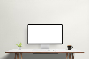 White screen on modern computer display on work desk. Mockup for agency web page or app presentation. Ideal for showcasing digital designs and professional portfolio