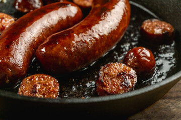 Pan cooking precooked juicy smoked sausage with cast iron skillet
