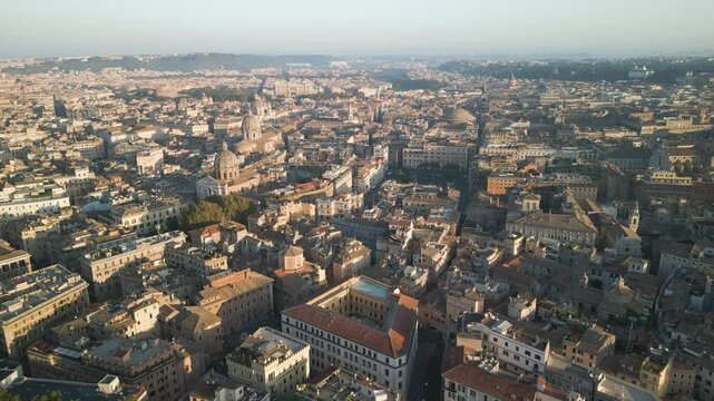 Panoramic aerial overview above old historic dense patterned home buildings of Orange Garden Italy
