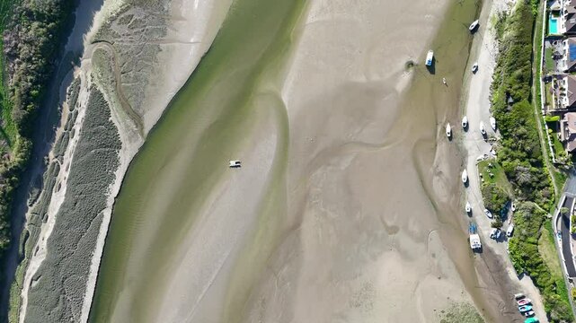 River Gannel and tidal estuary between Newquay town and the village of Crantock in Cornwall, UK