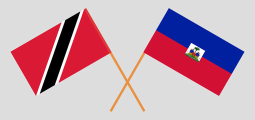 Crossed flags of Trinidad and Tobago and Haiti. Official colors. Correct proportion