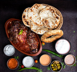Turkish_Iskandar Shawarma Meat With Souce, bread and olive. 