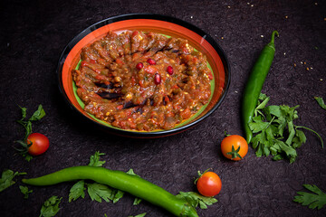 Turkish or arabic baba ganuj also known as turkish baba ghanous, delious turkish dish. Baba ganoush dip made with grilled aubergine or eggplant, lemon juice, olive oil and tahini. Vegetarian starter.