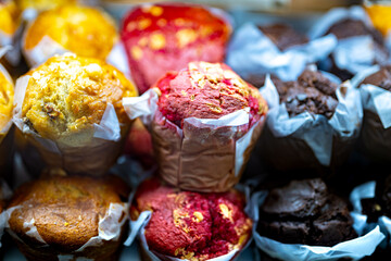 Different types of muffins for sale in a bakery