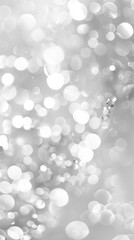 A close up of a white snowflake on a window with a blurred background